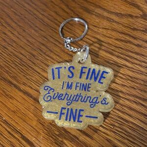 Gold Keychain with Blue Text